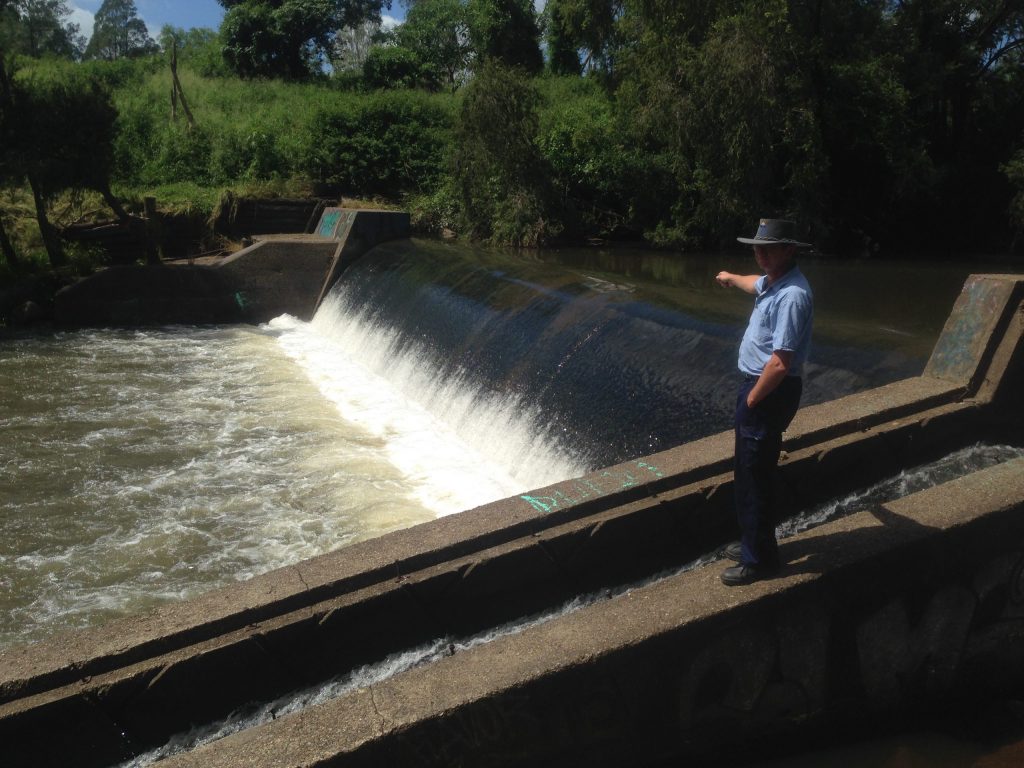 Man on weir.