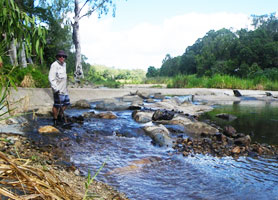 Catchment Solutions team member at the Forbes Road causeway.